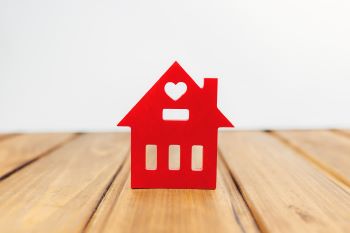 little-wooden-red-house-on-the-background-2025-03-09-12-37-36-utc 350