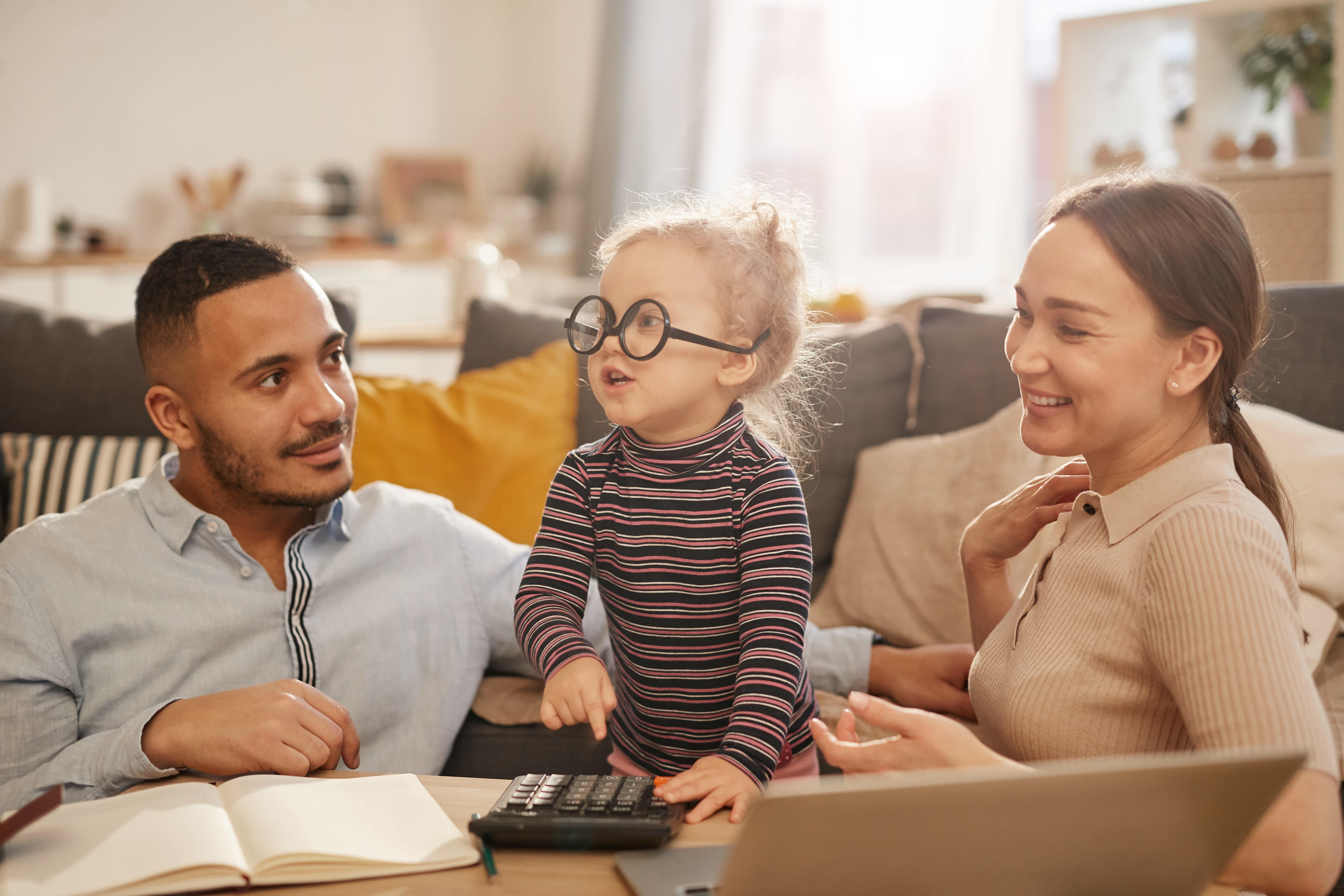 young family working on home finances